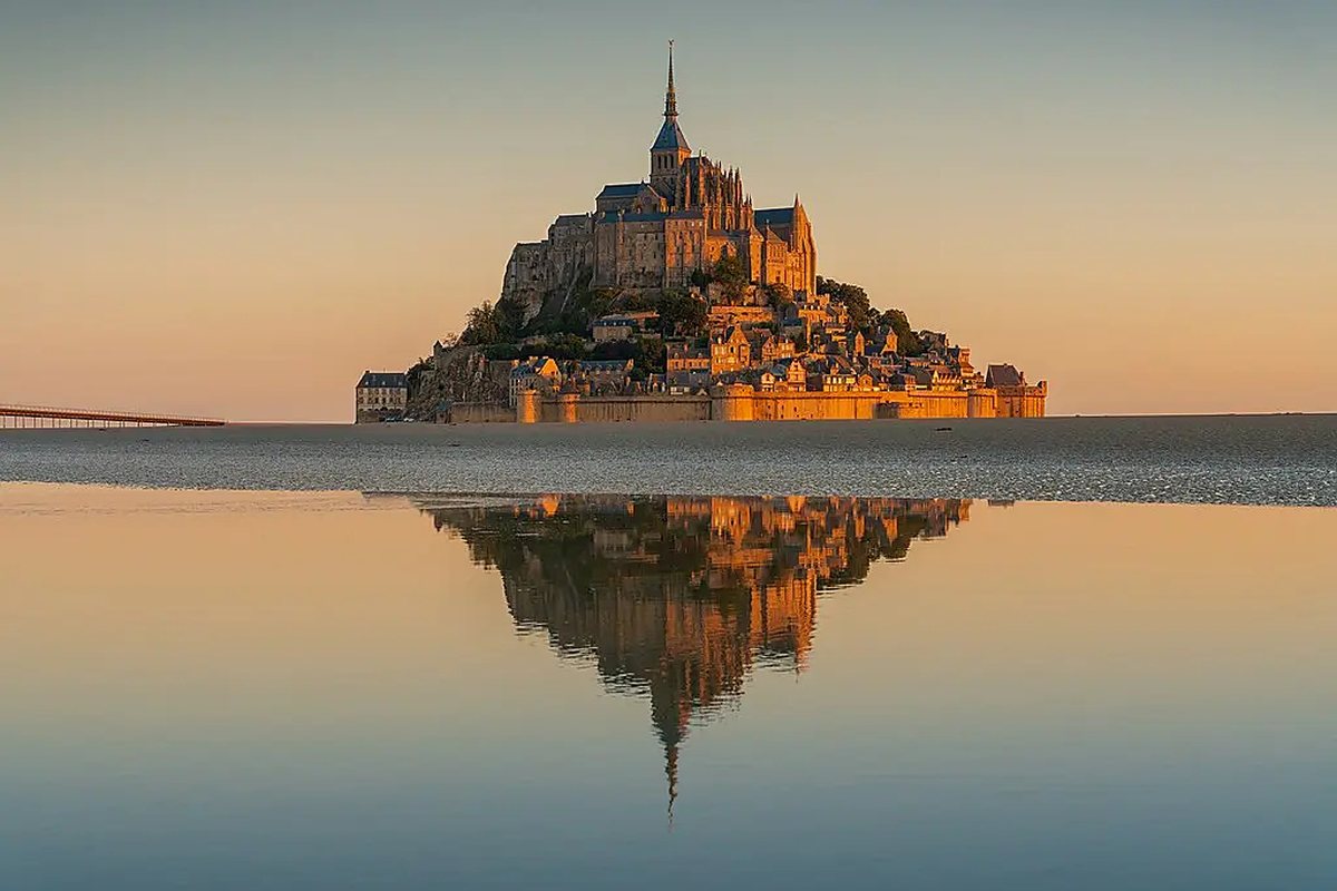 Mont-Saint-Michel, Mont-Saint-Michel reflected in the bay at sunset